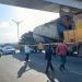The driver of a truck stuck under the footbridge on George Walker Bush highway arrested