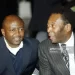 Pele raising Abedi Pele's hand