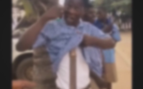A student brandishing a machete in school