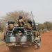Soldiers from Burkina Faso patrol on the road of Gorgadji in the Sahel area
