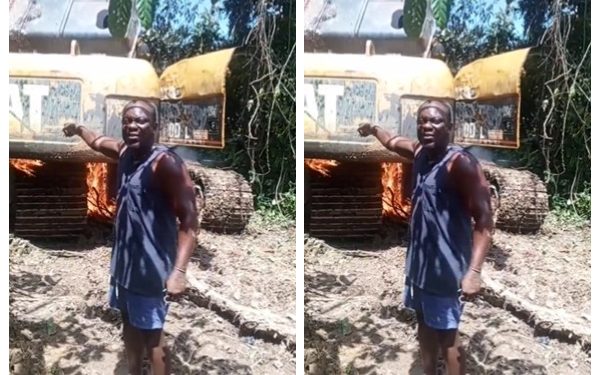 The excavator burnt by the military taskforce