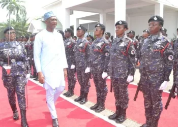 Mohammed Mubarak Muntaka inspecting a guard of honour