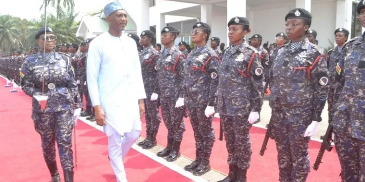 Mohammed Mubarak Muntaka inspecting a guard of honour