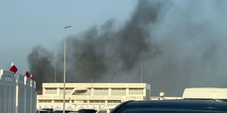 Smoke rises after several blasts were heard in Doha, Qatar, September 9, 2025. REUTERS/Ibraheem Abu Mustafa